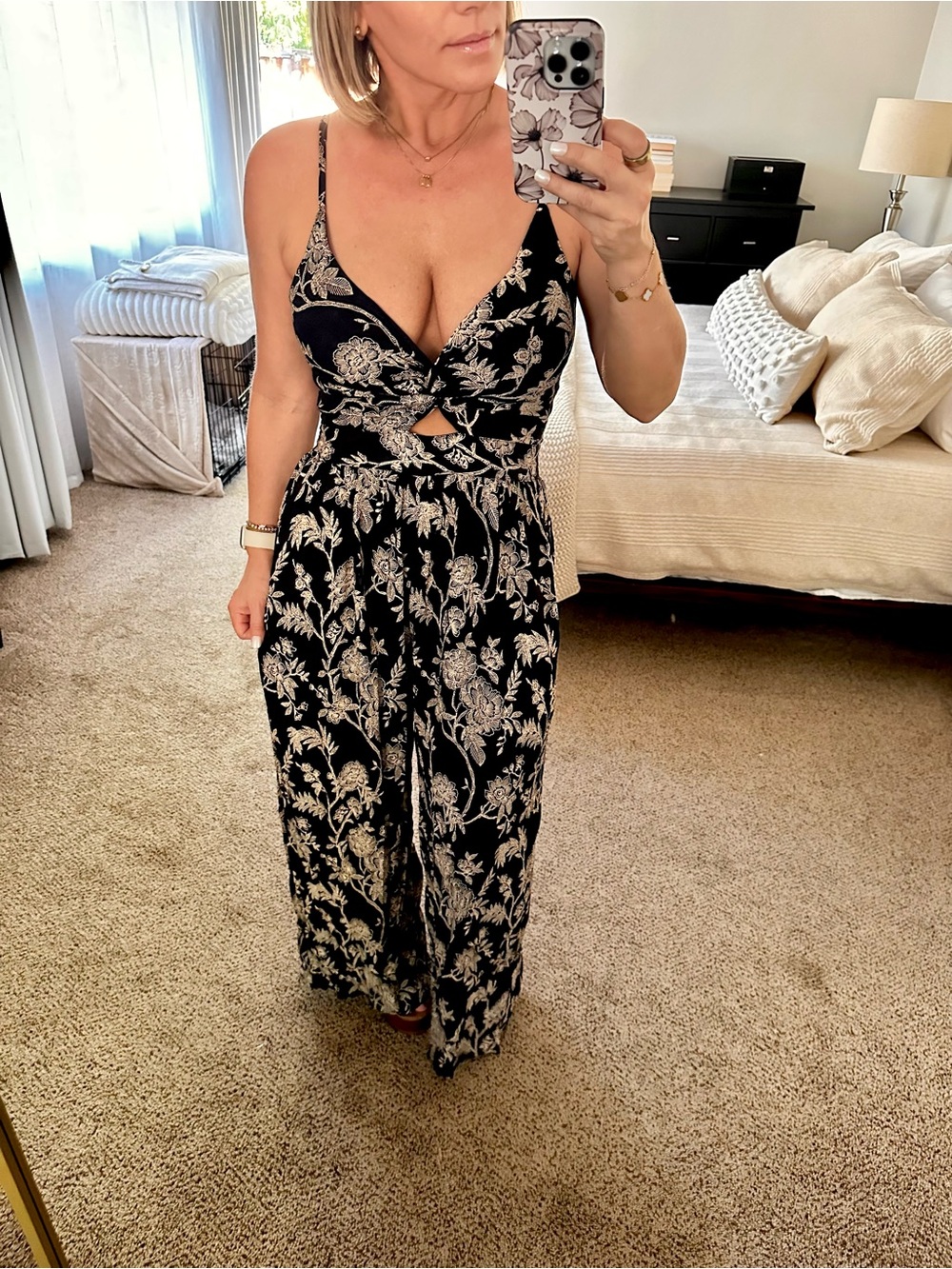 |  angie • black floral jumpsuit w. cutout detail • medium  |